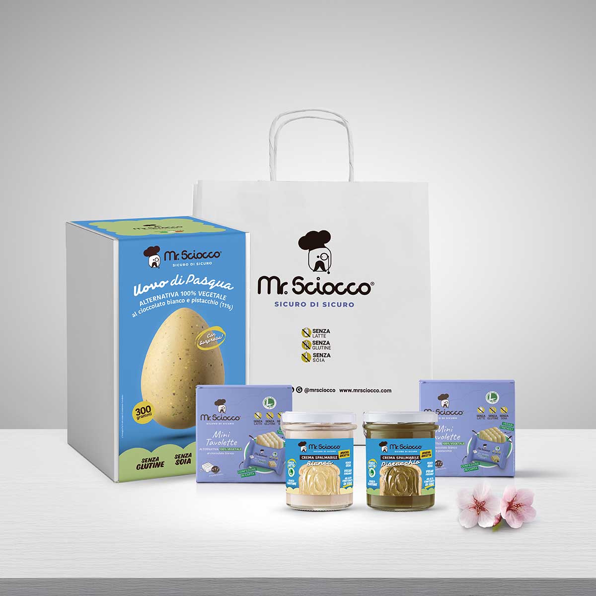 Uovo di cioccolato con granella di pistacchio senza lattosio e proteine del latte. Vegano